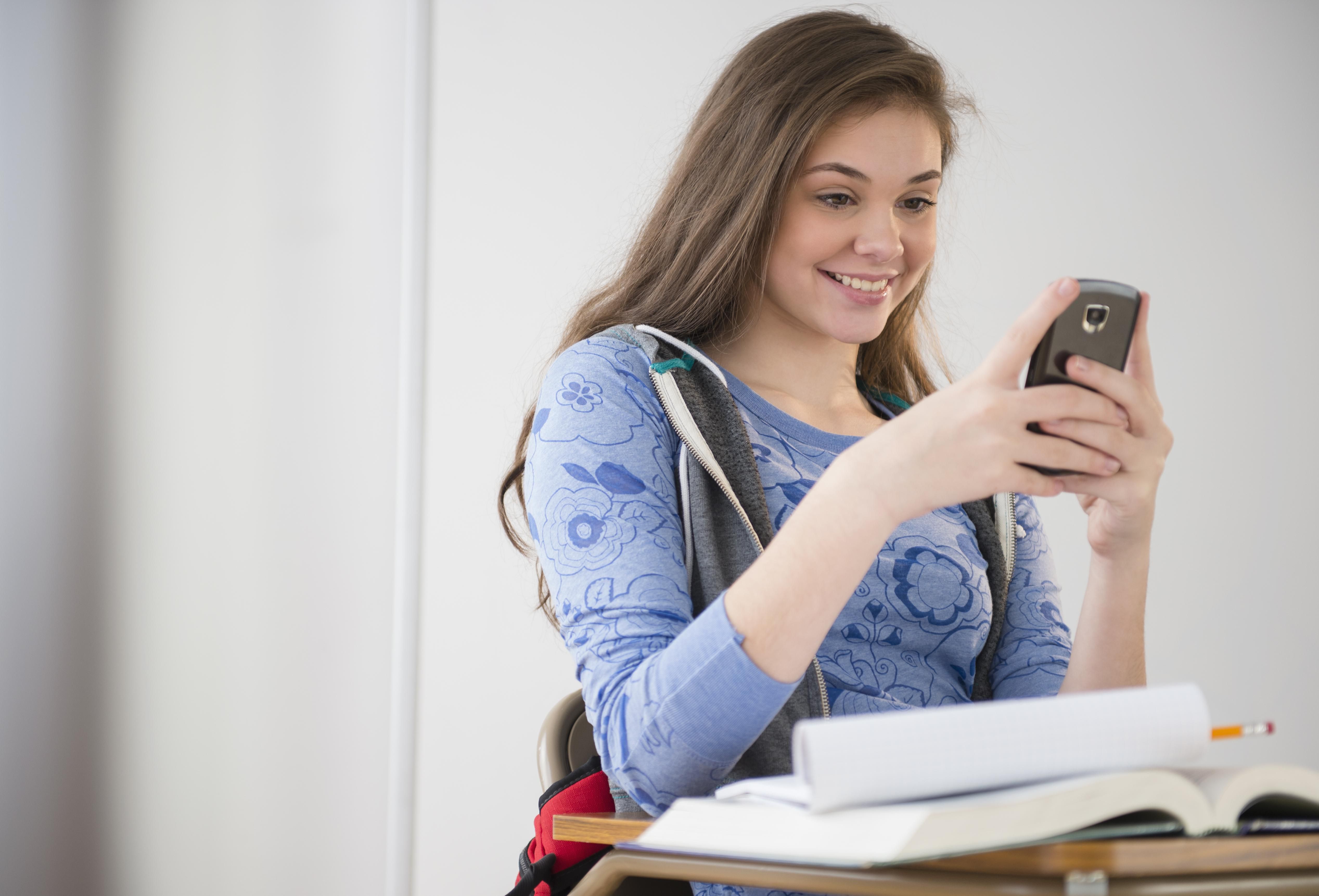 Teen Girl With Phone