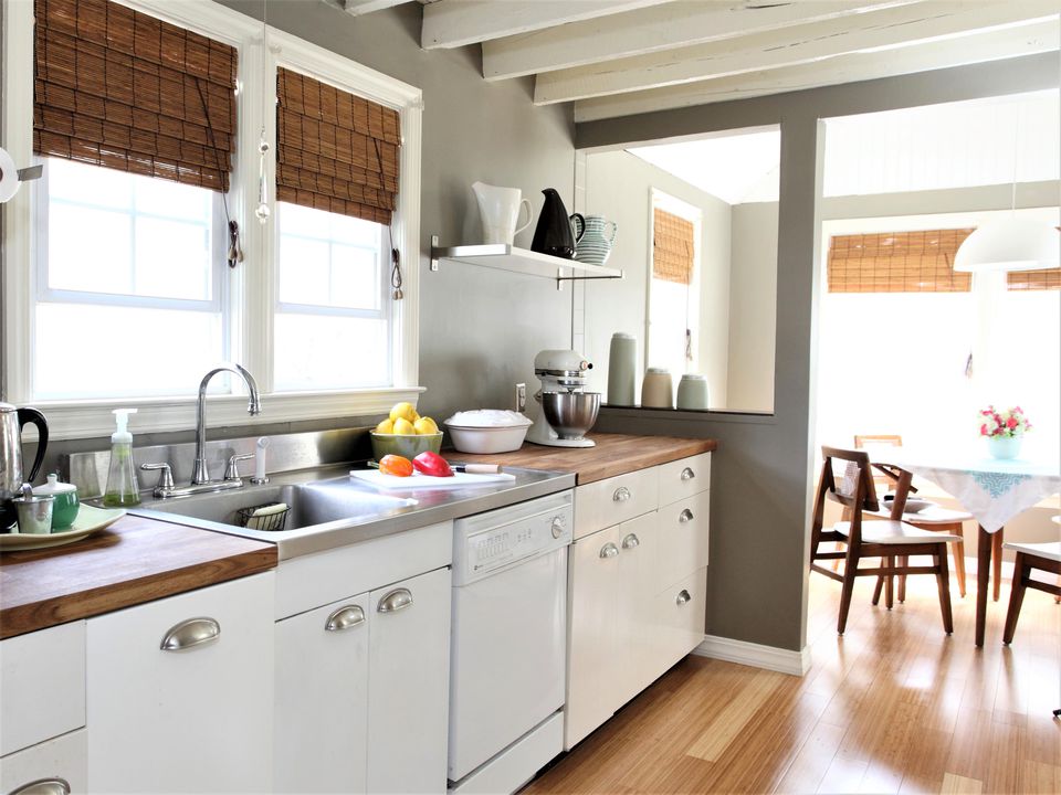 Kitchen With White Cabinets and Open Beam Ceiling 582f73f03df78c6f6a1a1fca