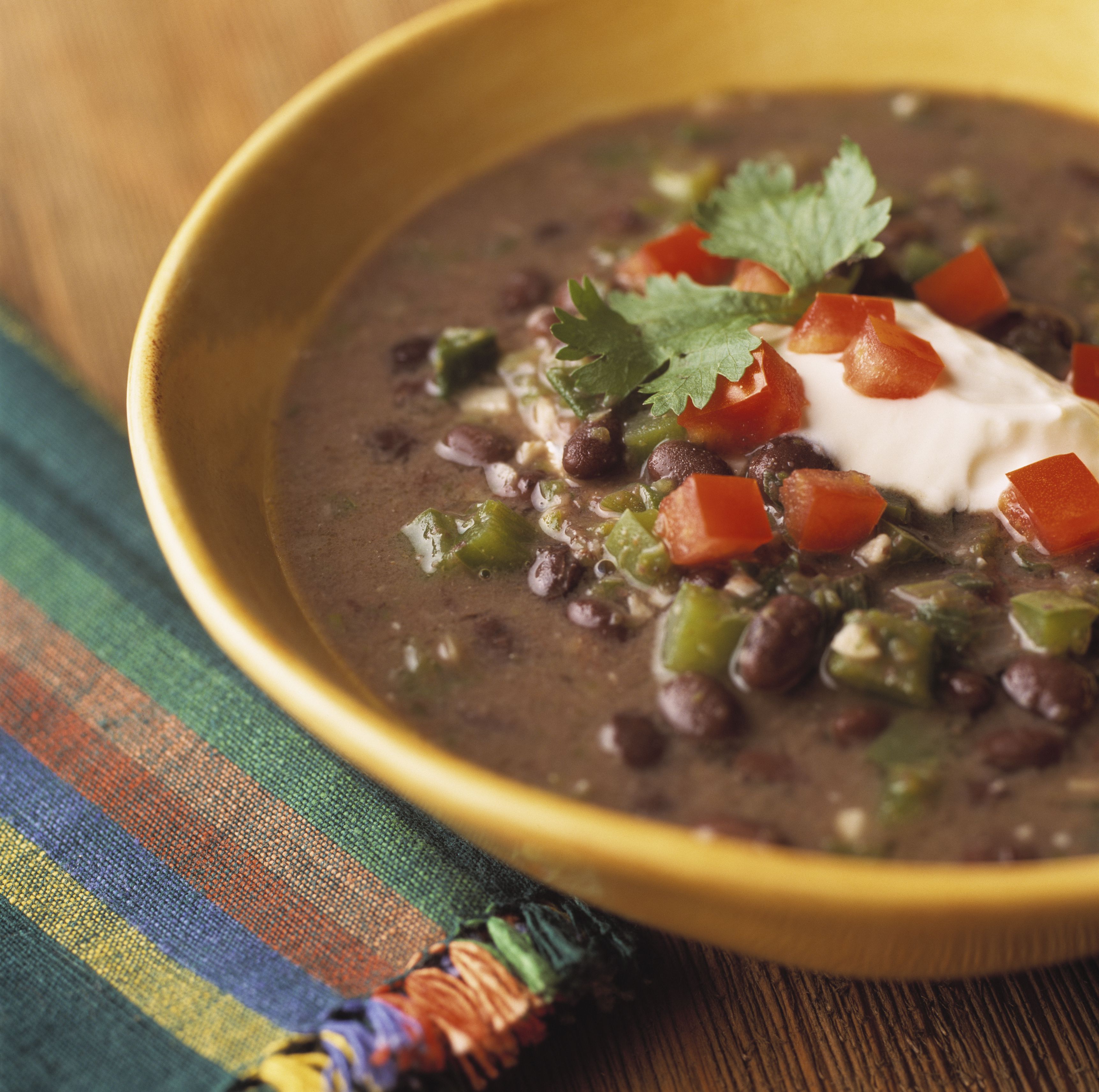 Quick And Easy Vegetarian Black Bean Soup With Vegan Option   Bowl Of Black Bean Soup With Sour Cream 527264852 5aa9c9f130371300379f85e2 