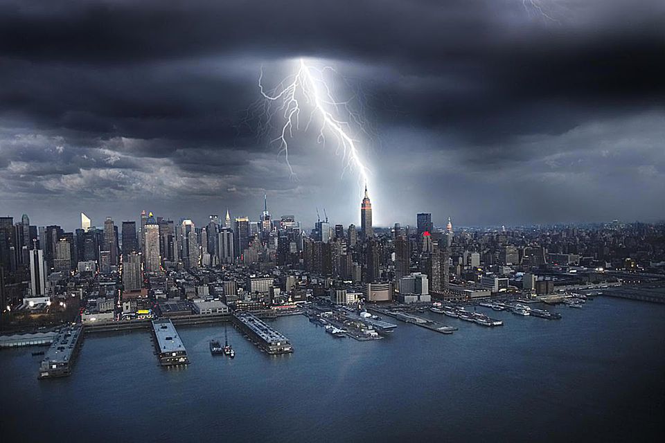 New York City, lightning striking Empire State building. Aerial view.