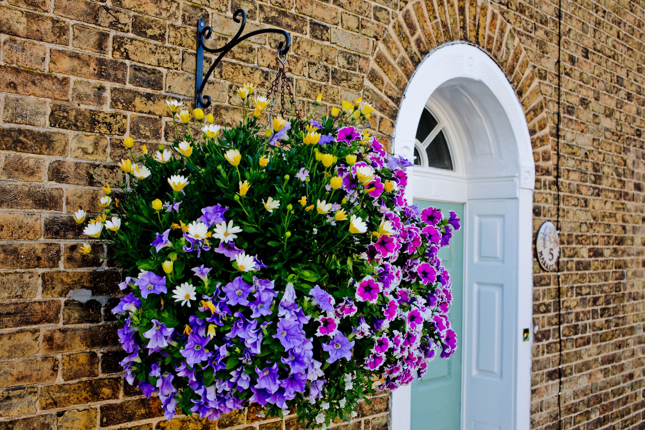 Basket of flowers GettyImages 670762741 588b85453df78caebc454dfb