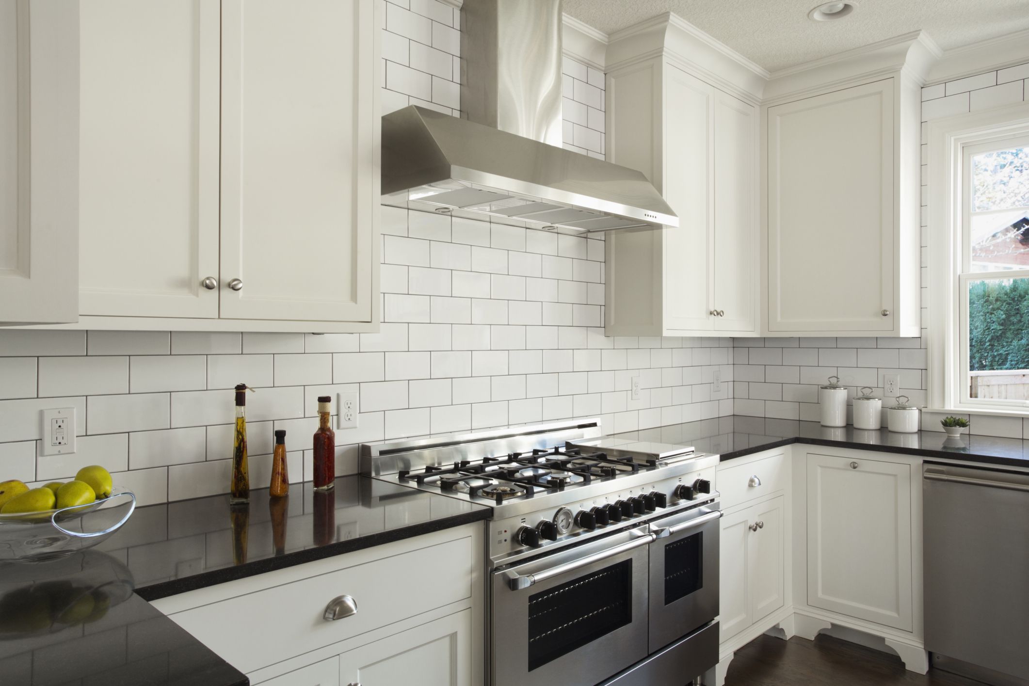 kitchen with subway tile half wall