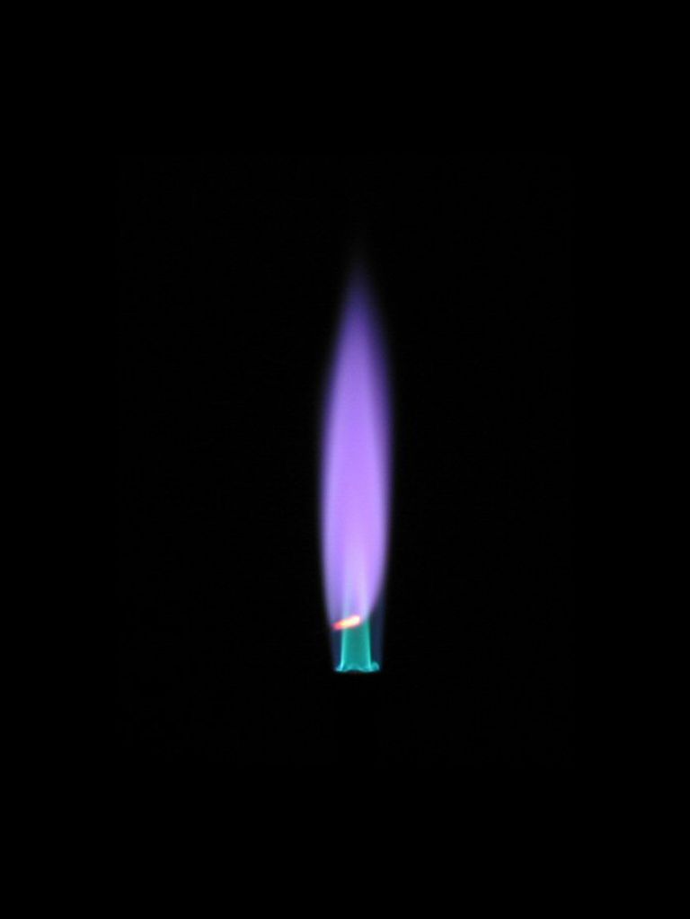 Cesium turns a flame violet in a flame test.