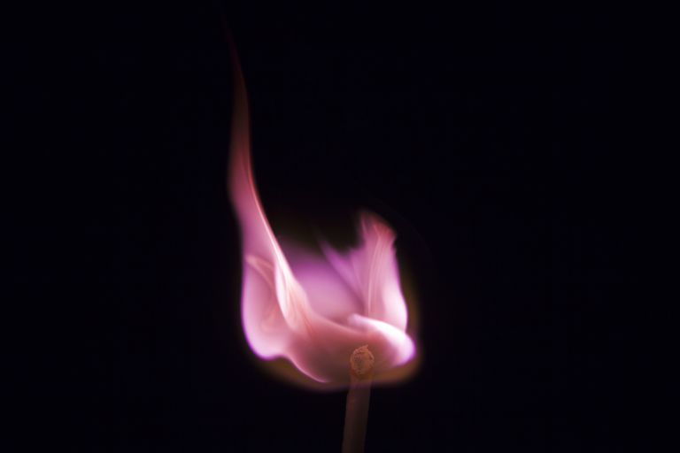 Lithium salts turn a flame hot pink to magenta.