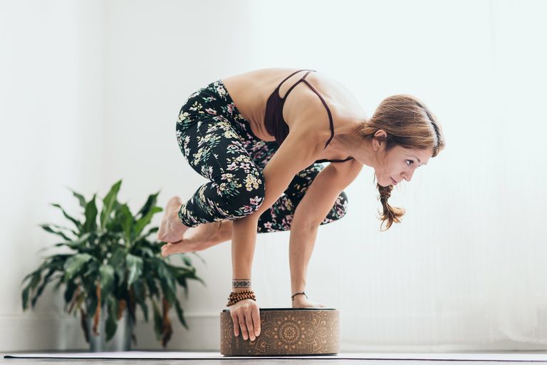 yoga wheel crow pose