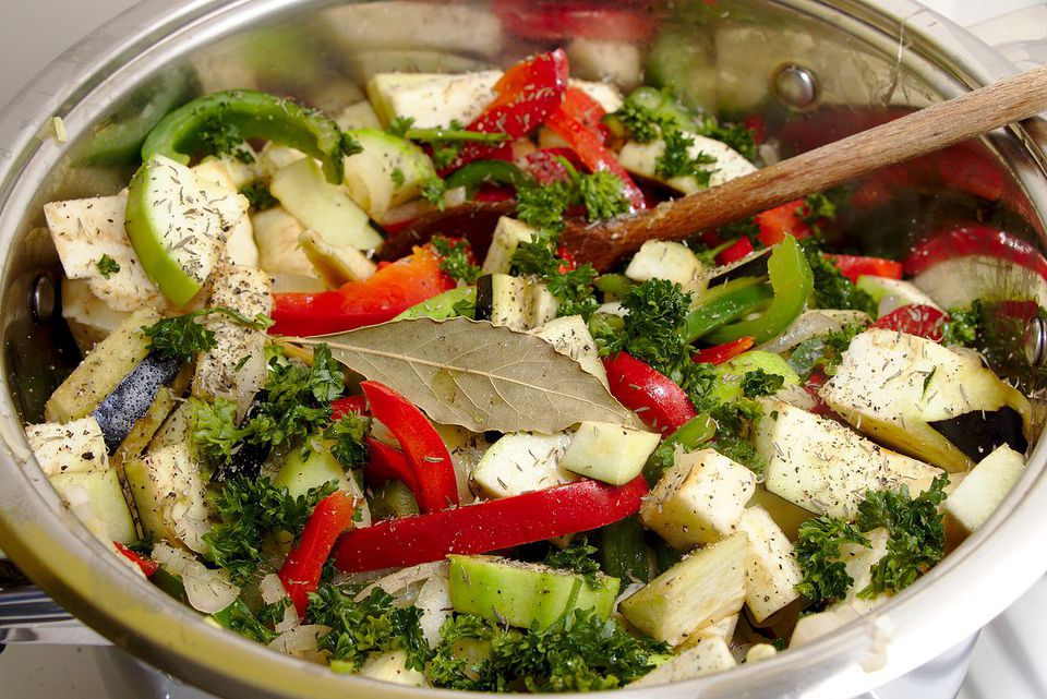 Beginning of cooking a ratatouille dish in a pot