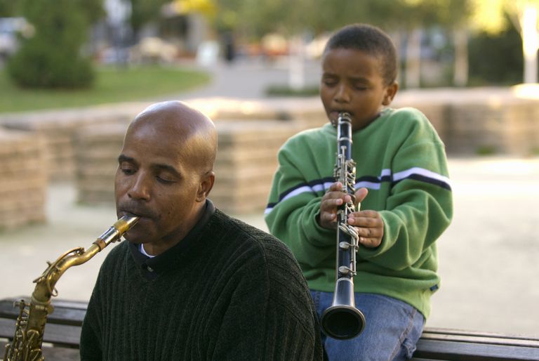 Father and son playing instruments