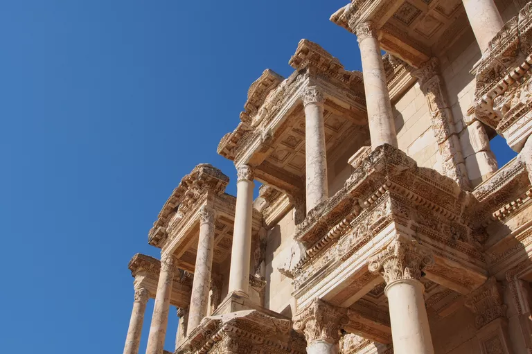 Low angle looking up the facade of the Celsus Library in Ephesus, Turkey