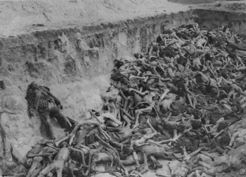 A mass grave in Bergen-Belsen concentration camp. (May 1, 1945)