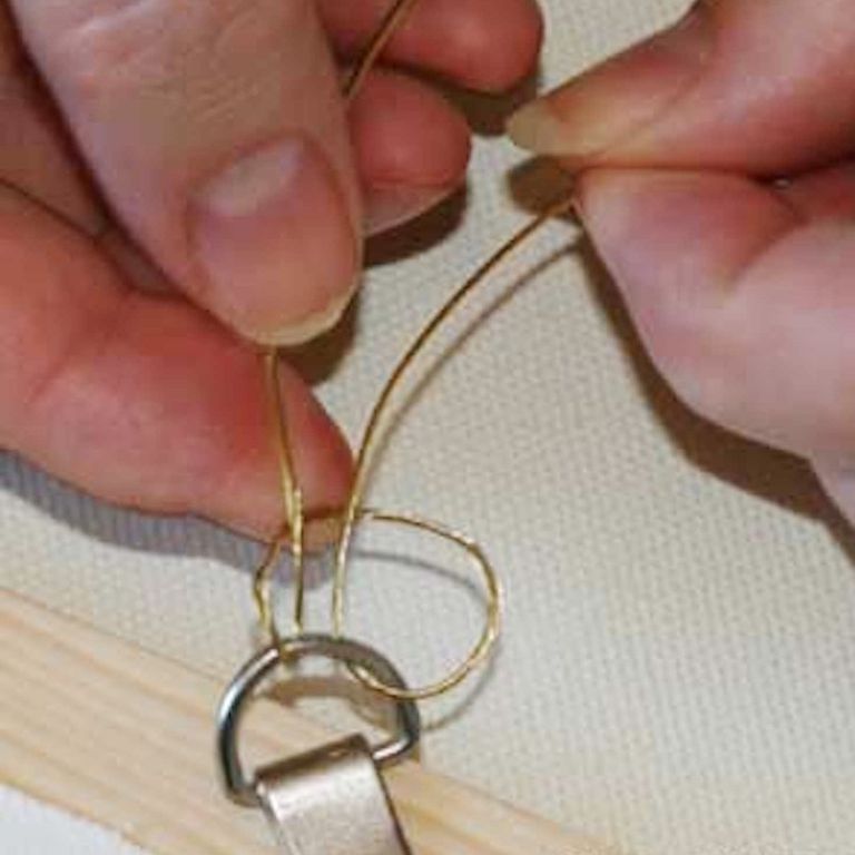 How to Hang a Painting With Wire and DRings