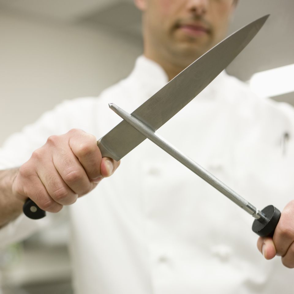 Basic Knife Skills For Culinary Arts   Chef Sharpening Knife In Kitchen 84303388 5883f9bc5f9b58bdb3e193f0 