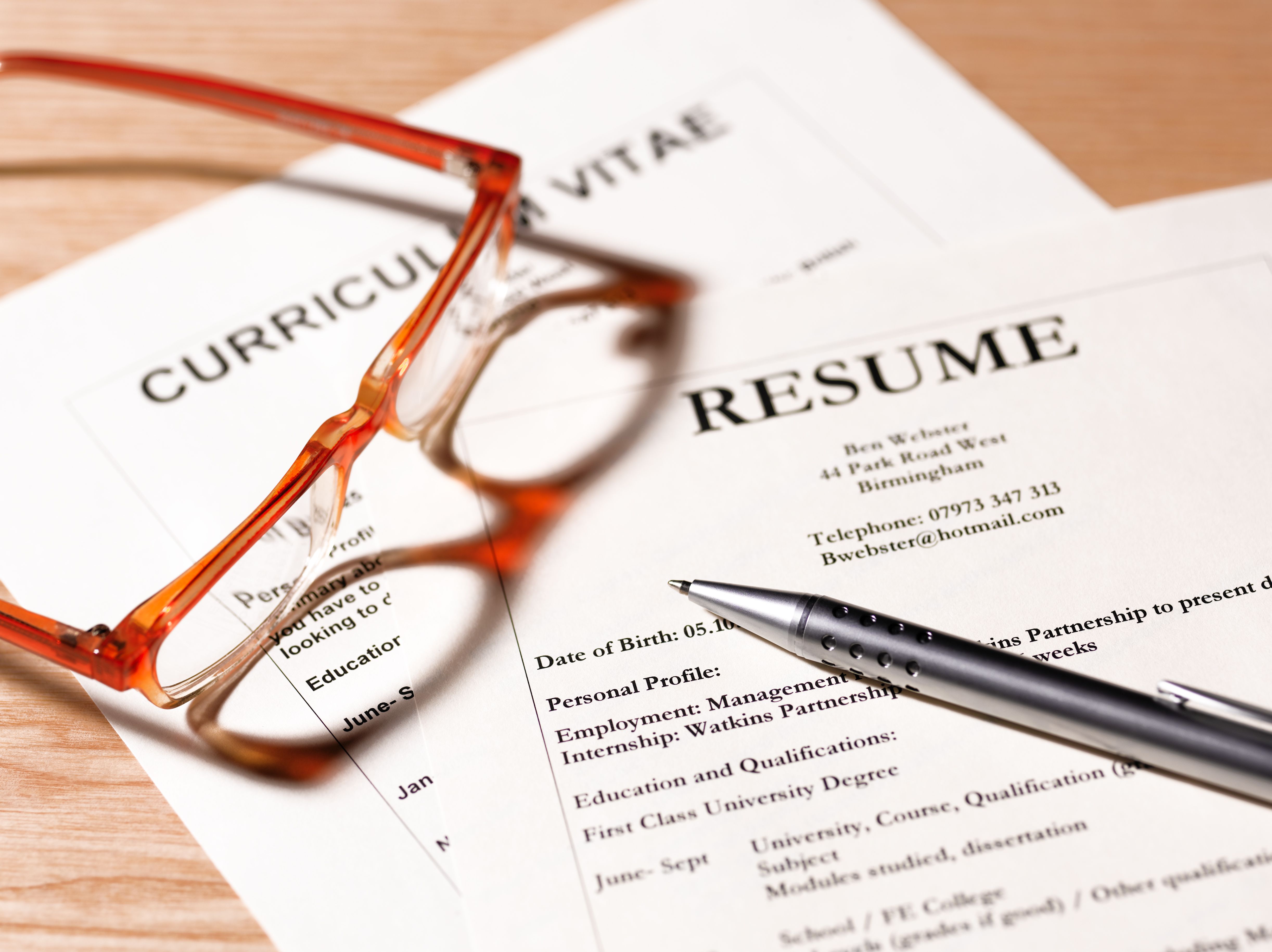 cv and resume with glasses and pen  93522449 5970ee8baad52b001137ed79