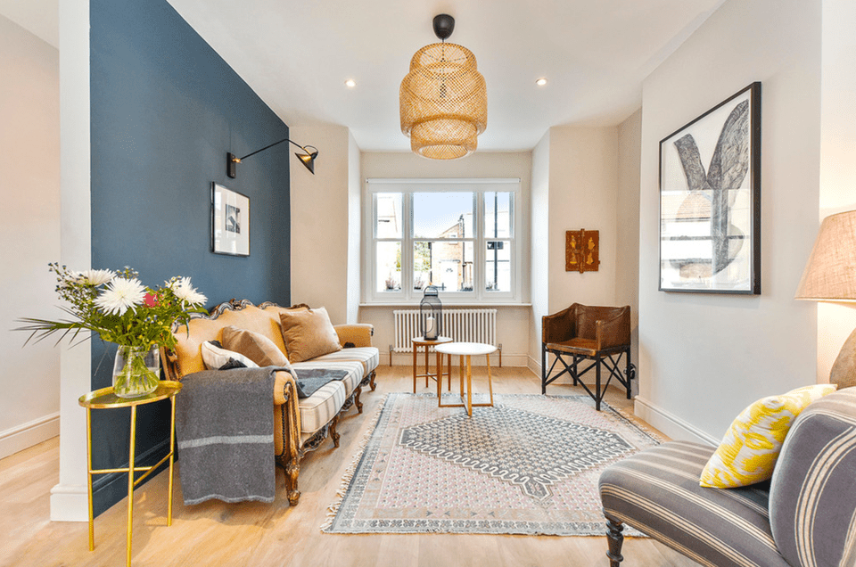 blue accent wall in living room