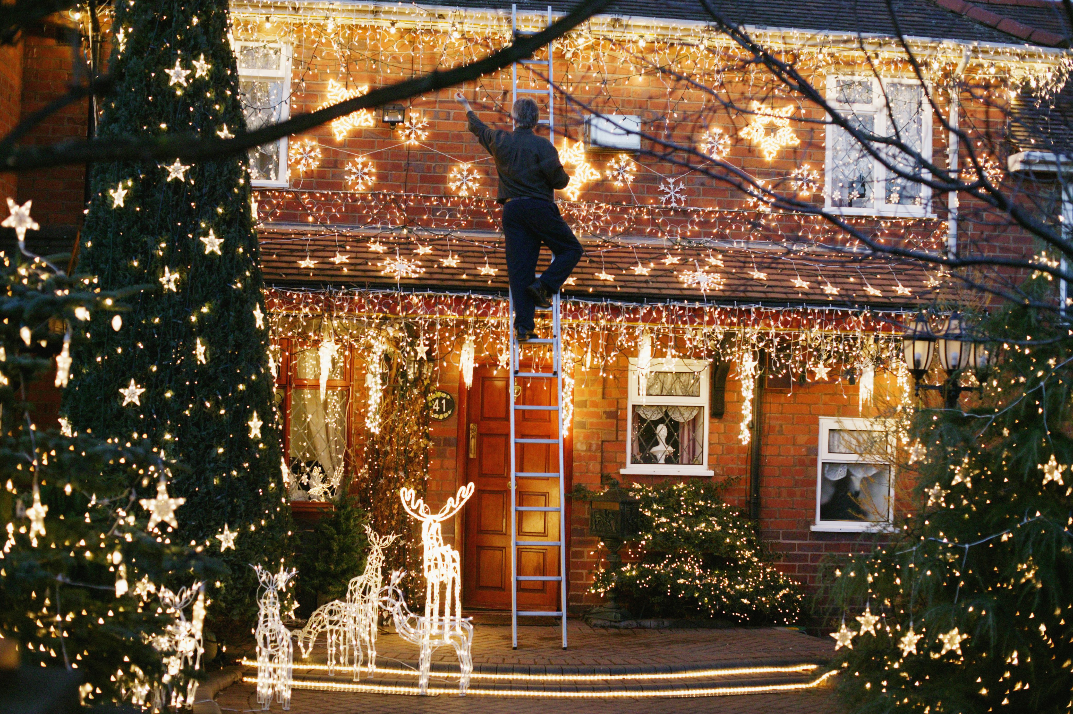Christmas Lights In The Front Garden Of A House 522104326 5a1ef4ff4e46ba001a9ac0bf 