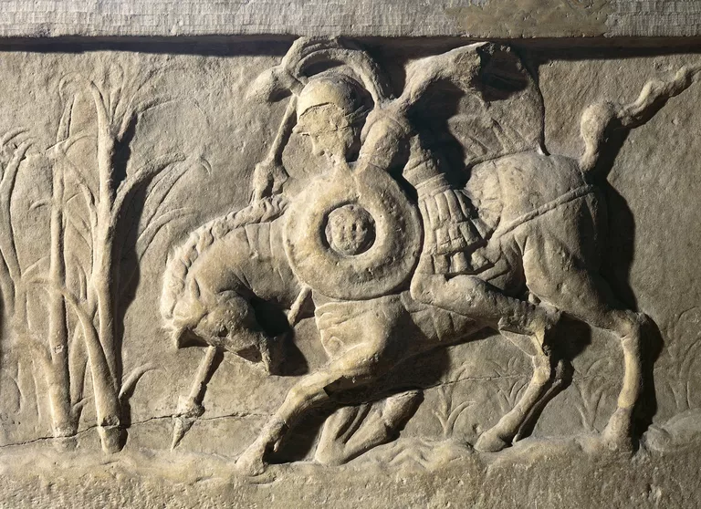 Roman civilization, Relief with Marcus Curtius on horseback leaping into chasm Lacus Curtius