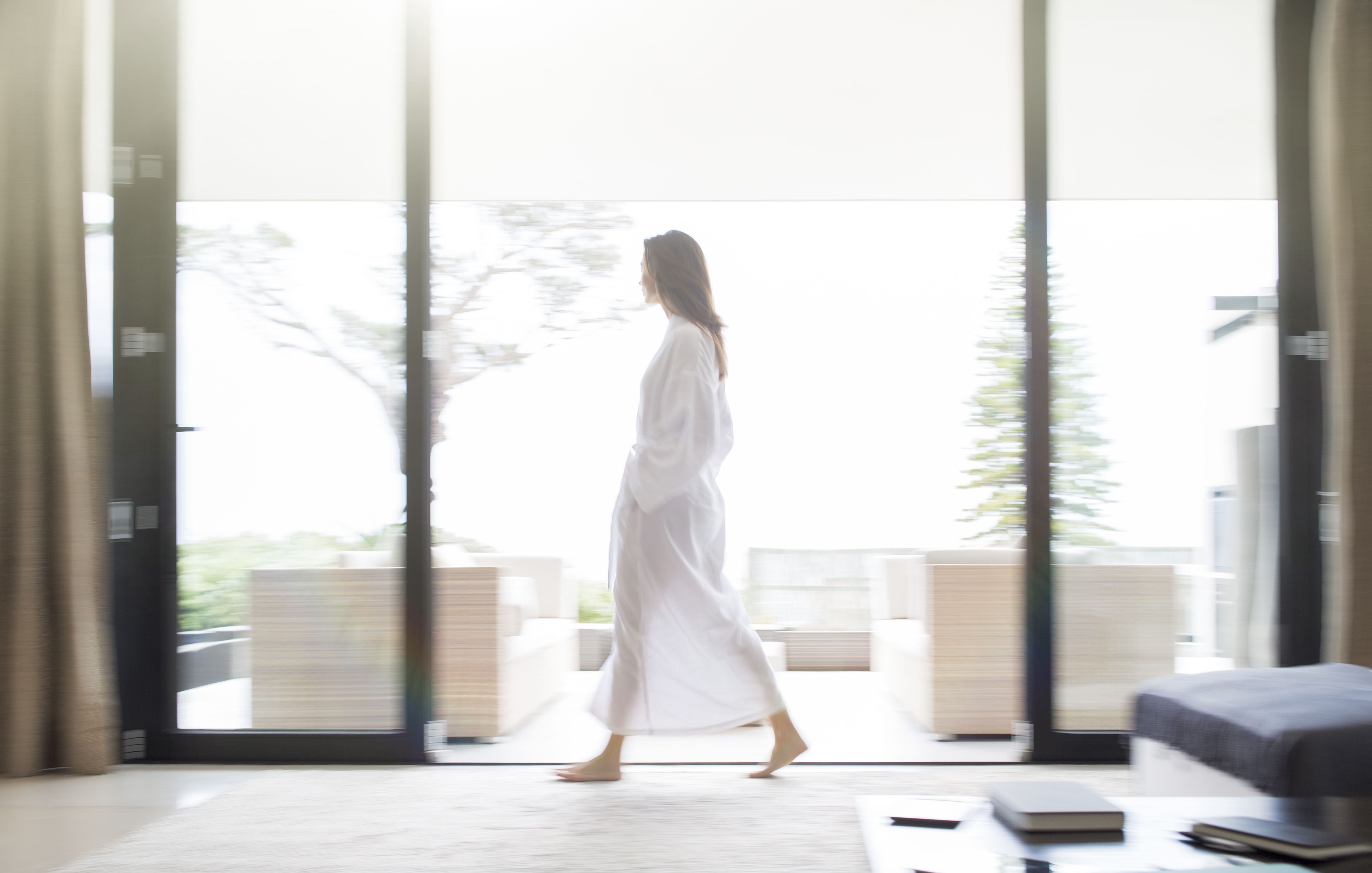 woman walking in living room