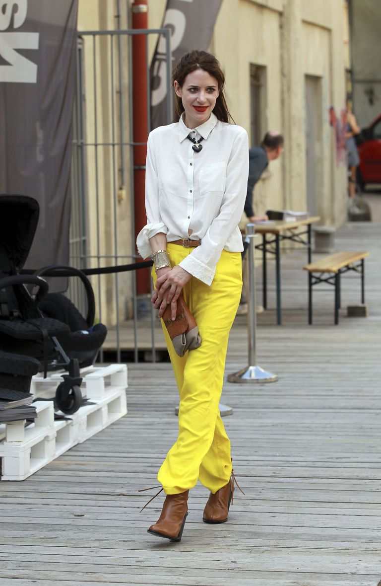 yellow top black pants