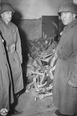 Congressman John M. Vorys(right) viewing a room full of corpses while on an inspection of Dachau.