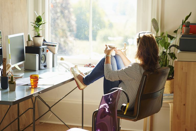 Woman sitting in home office