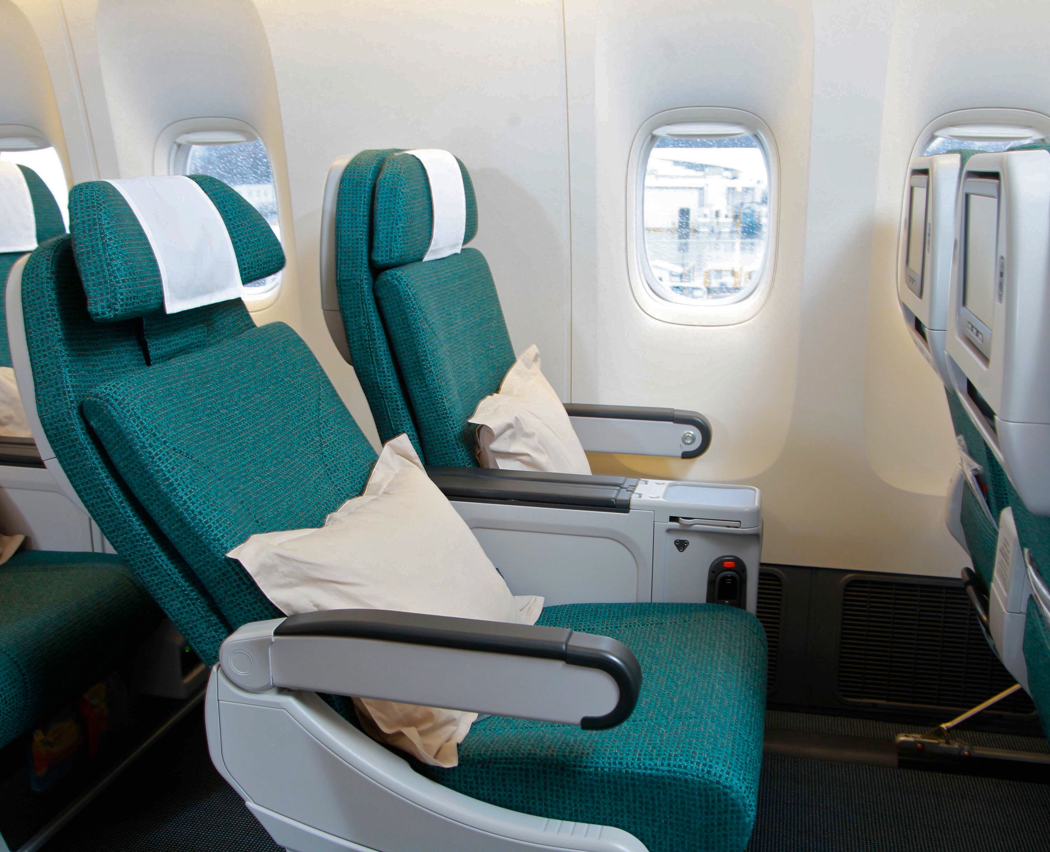economy seats premium airline cathay pacific recline coach cramped