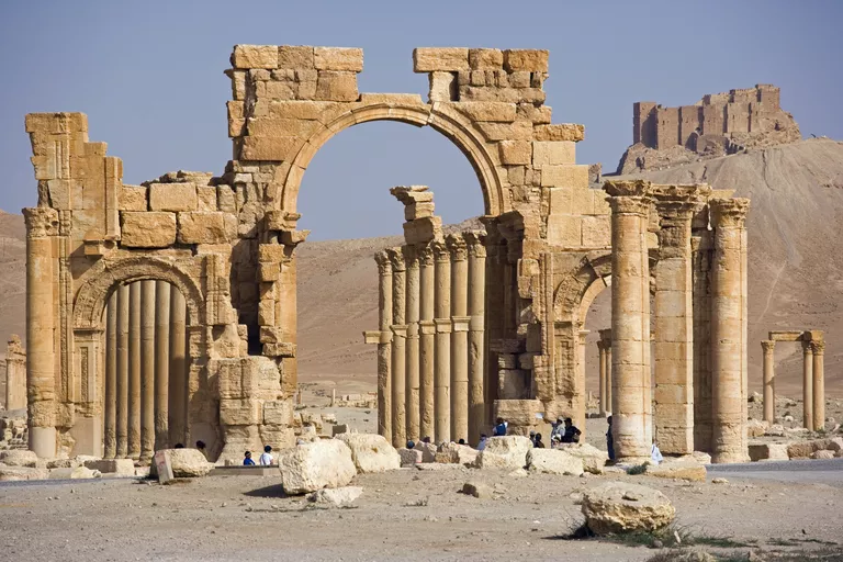 Monumental Arch of the Cardo Maximus in the ruined city of Palmyra, Syria