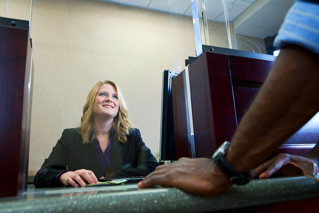 Busty Bank Teller