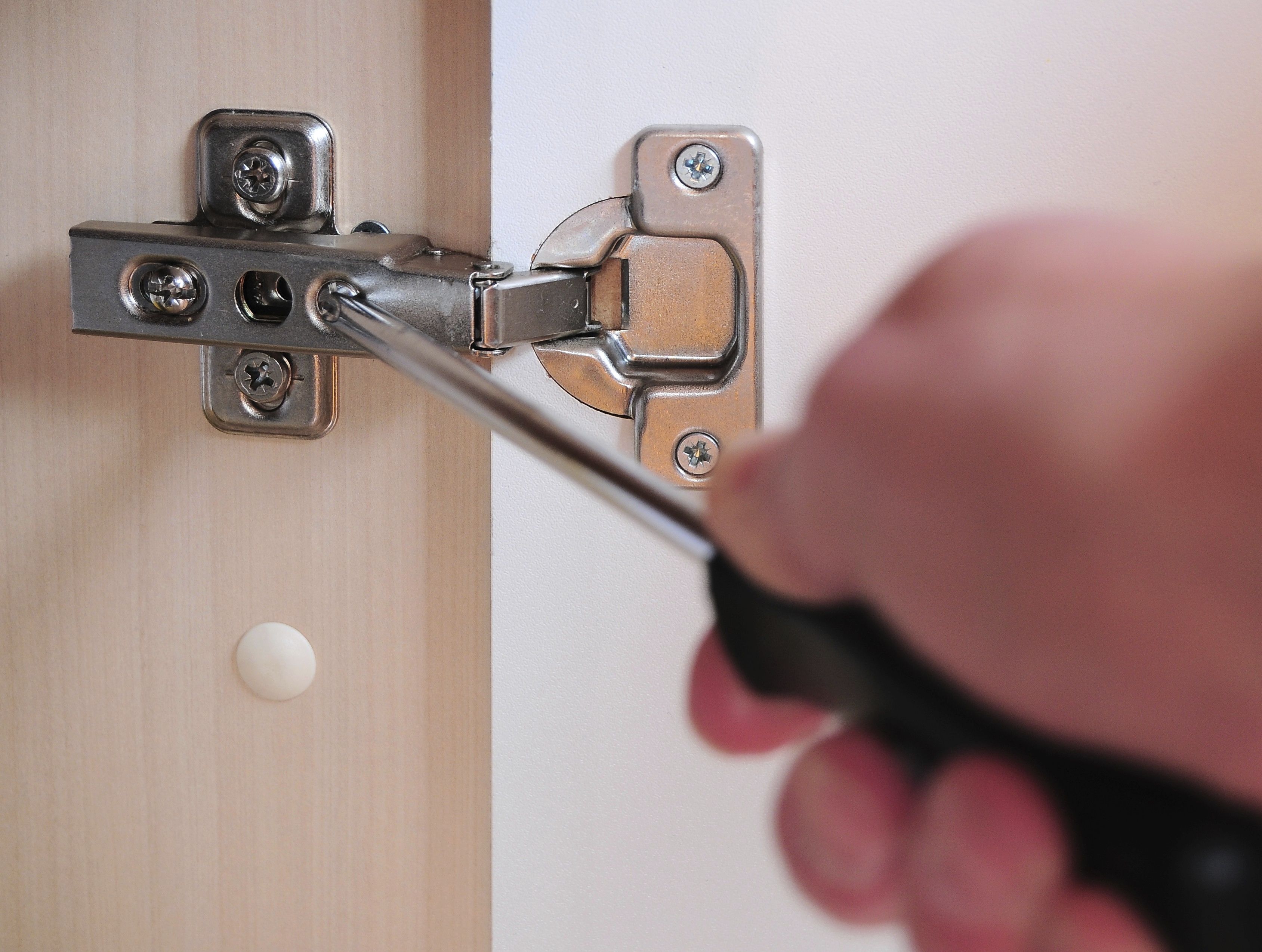 How to Adjust Cabinet Doors