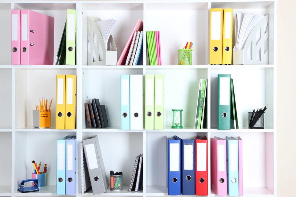 white office shelves with folders and different stationery  close up 465020509 5aa7bb873128340037b57028