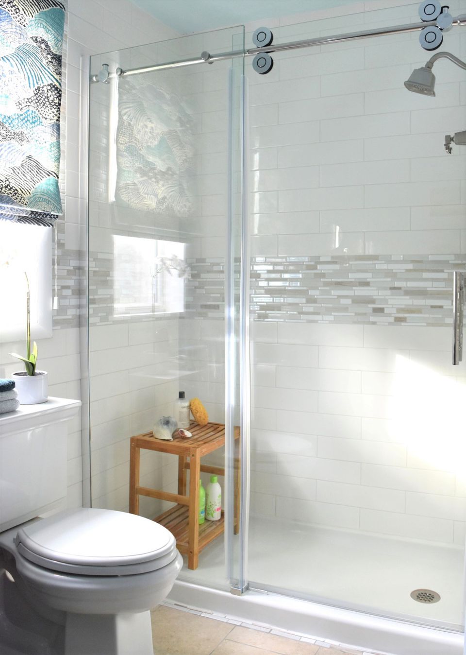 Bathroom Shower Design Ideas / Dazzling kohler shower base in Bathroom Midcentury with ... / In this bath, a custom blend of clear glass tile, opaque glass tile, and carrara marble tile brings shades of white, gray, and blue to the shower floor.