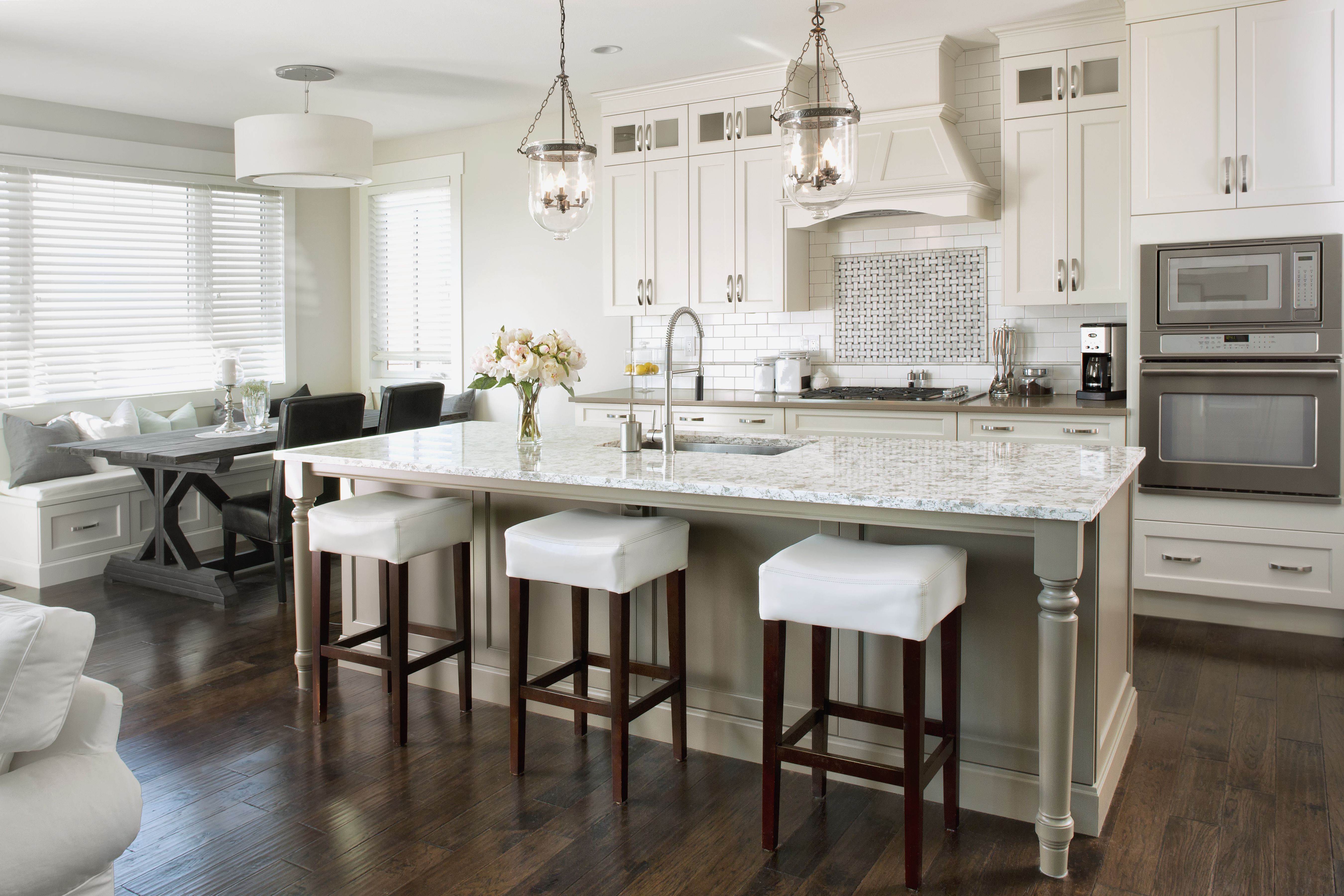 high end black and white kitchen with two sink