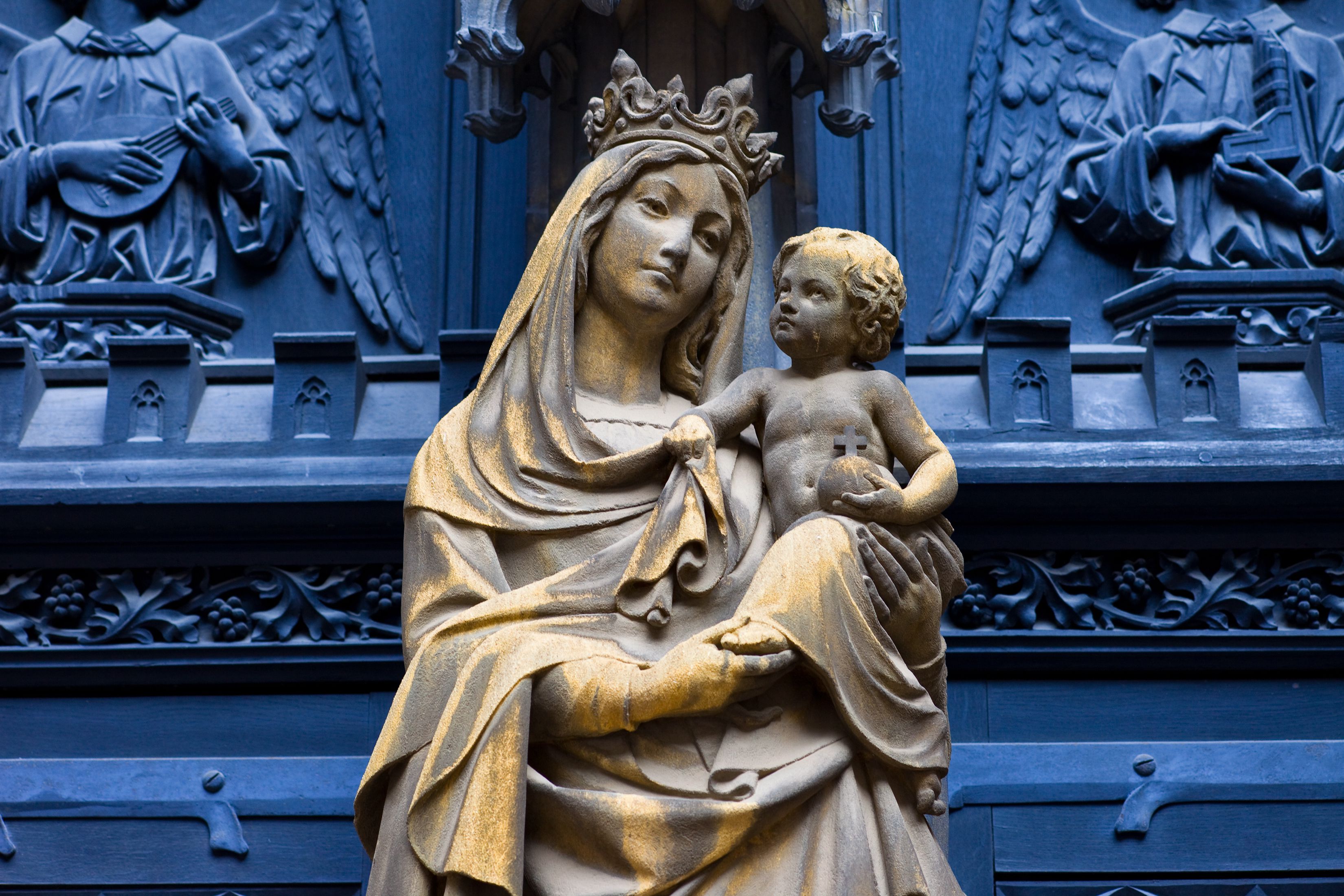 Image result for mary holding baby jesus statue