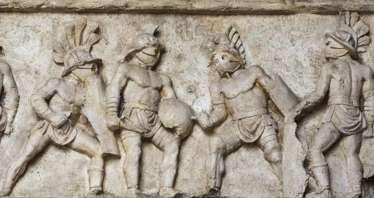 Rome, Italy. Bas relief of gladiators fighting.