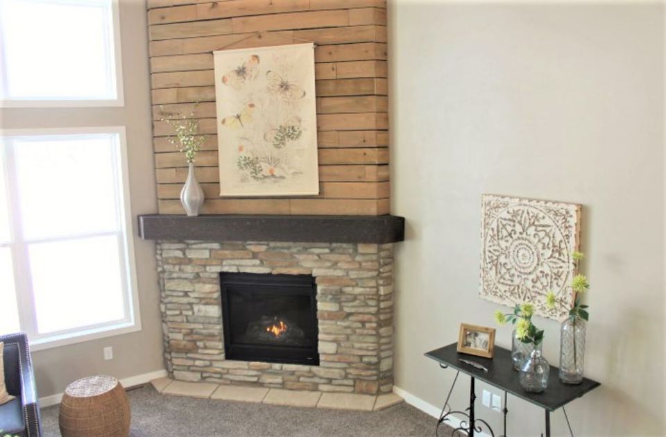 Check out 15 DIY fireplace surrounds made with reclaimed wood. Reclaimed wood