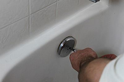 Unclog A Bathtub Drain Using A Snake