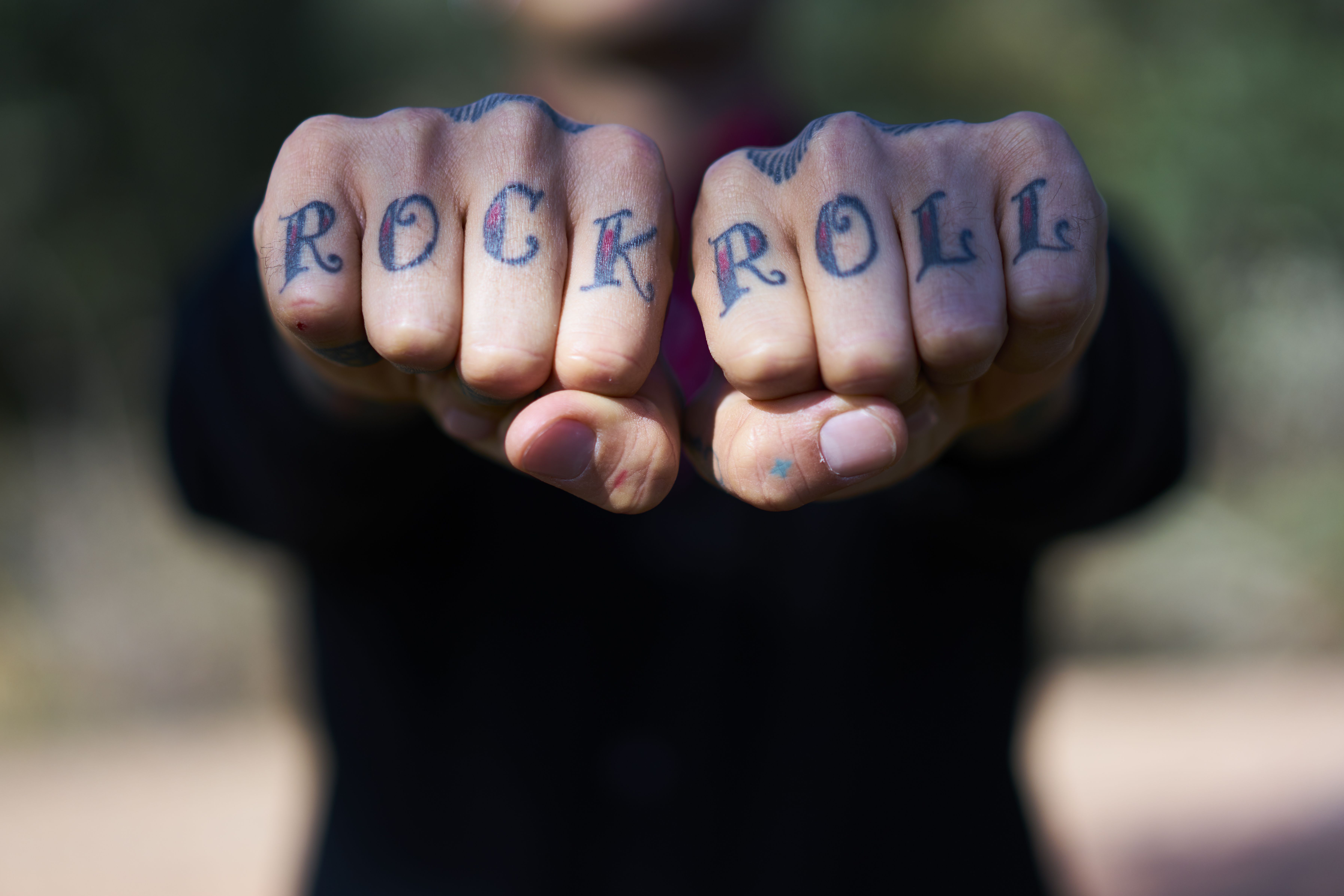 Hand Tattoo Information, Care, and Design Ideas