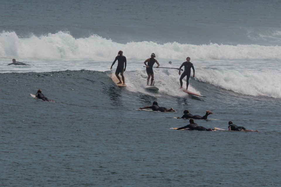 Surfers at Surfrider Beach, Malibu, CA