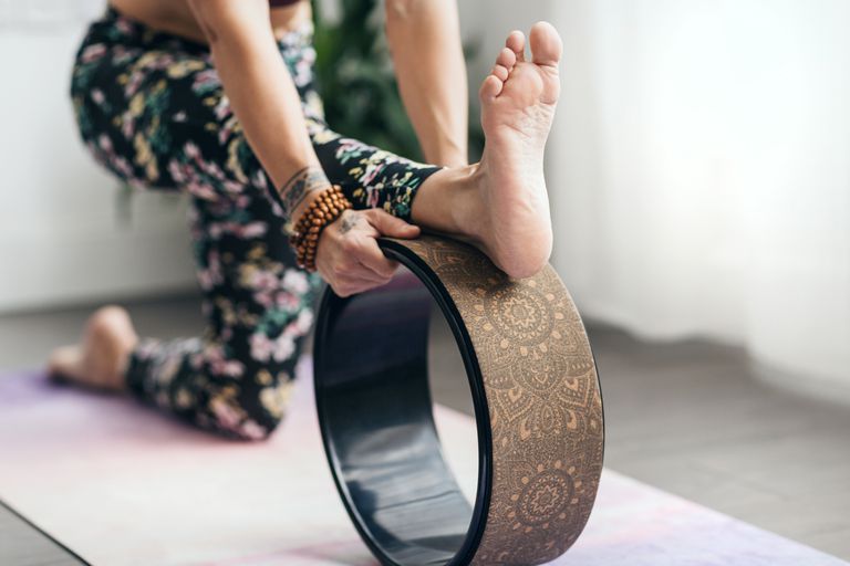 Wheel-Assisted Half Pyramid Pose