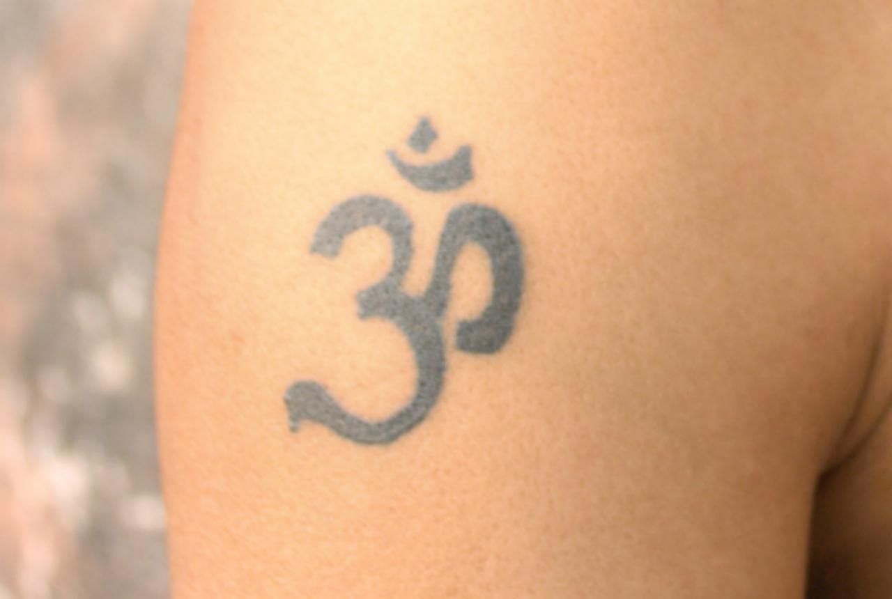 Om (Aum) Symbol Tattoo Meaning Explanation