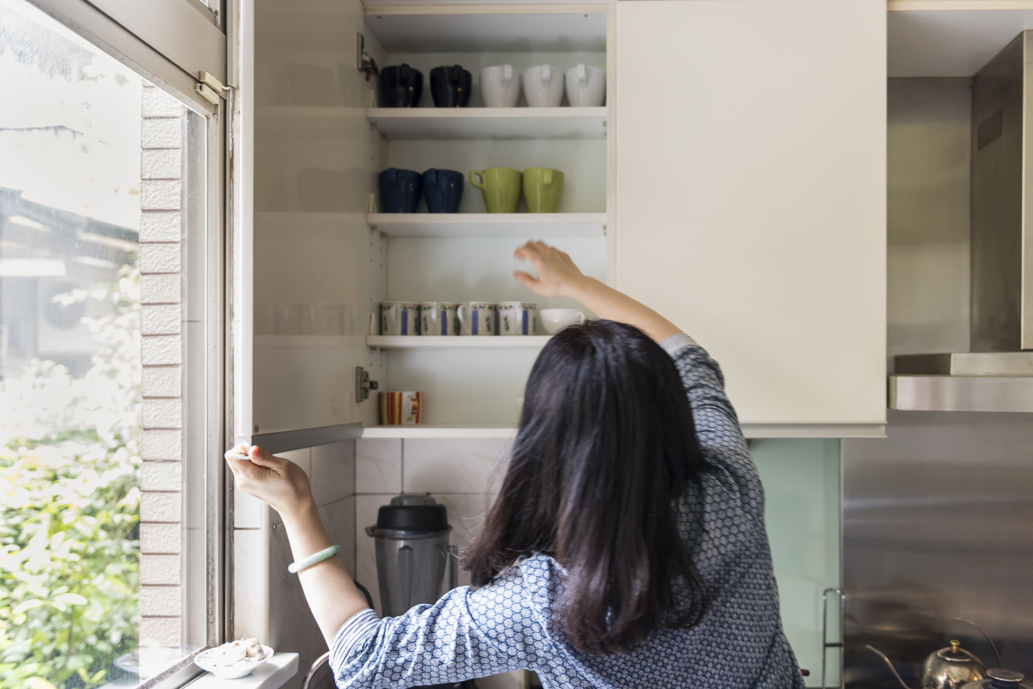 How to Remove Old Shelf Liner from Cabinets