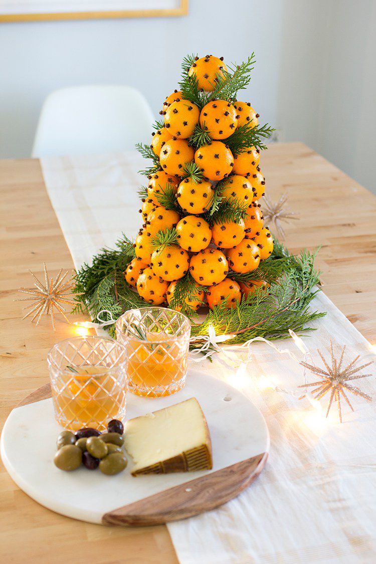 Christmas Topiary DIY Centerpiece made with oranges and greenery