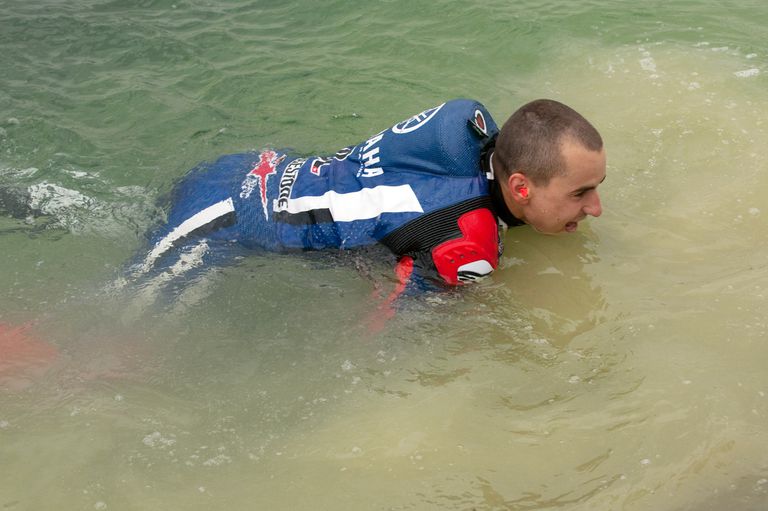 Motorcycle racer in water