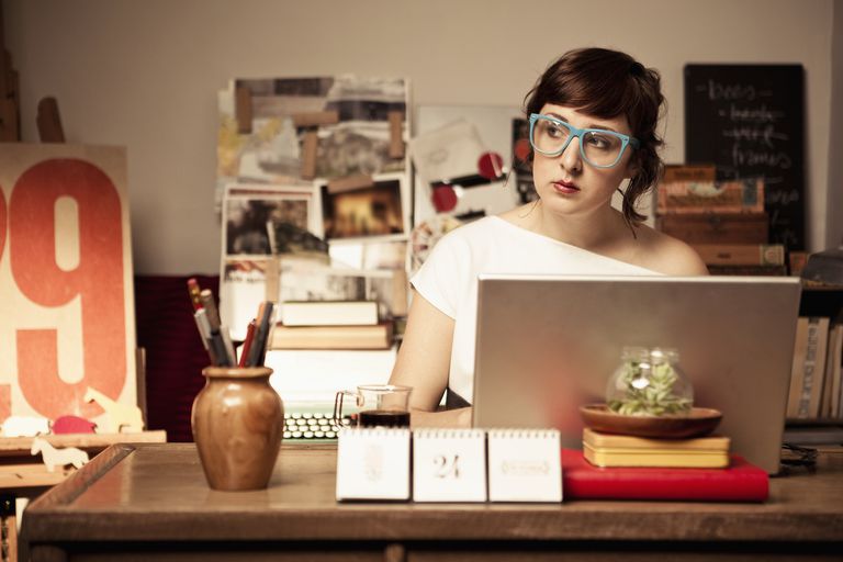 Woman blogging from home office