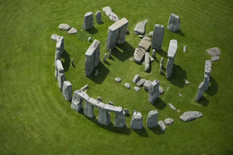 aerial view of scattered megalithic stones scattered in a circle