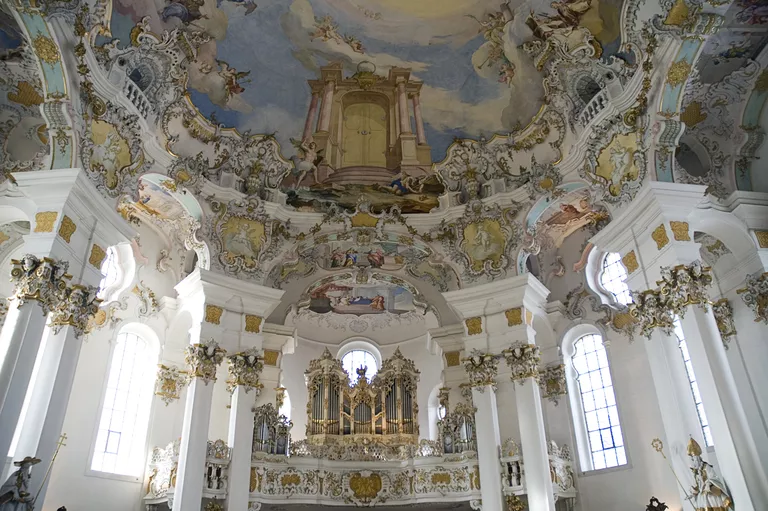 Germany, Bavaria, Wieskirche church interior view of the church organ and frescoes on ceiling depicting Door of Heaven / Paradise