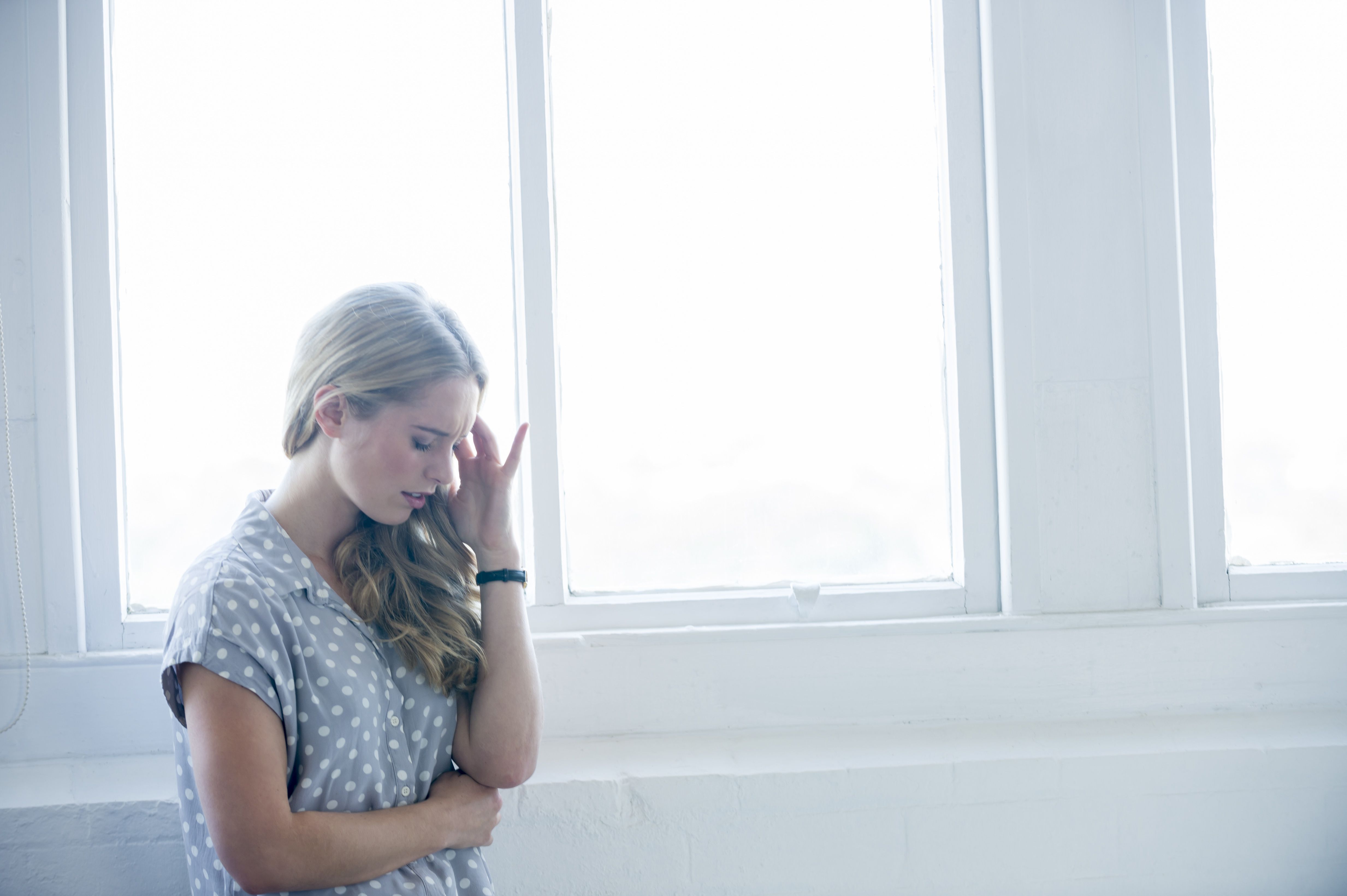 Woman feeling sick when standing up