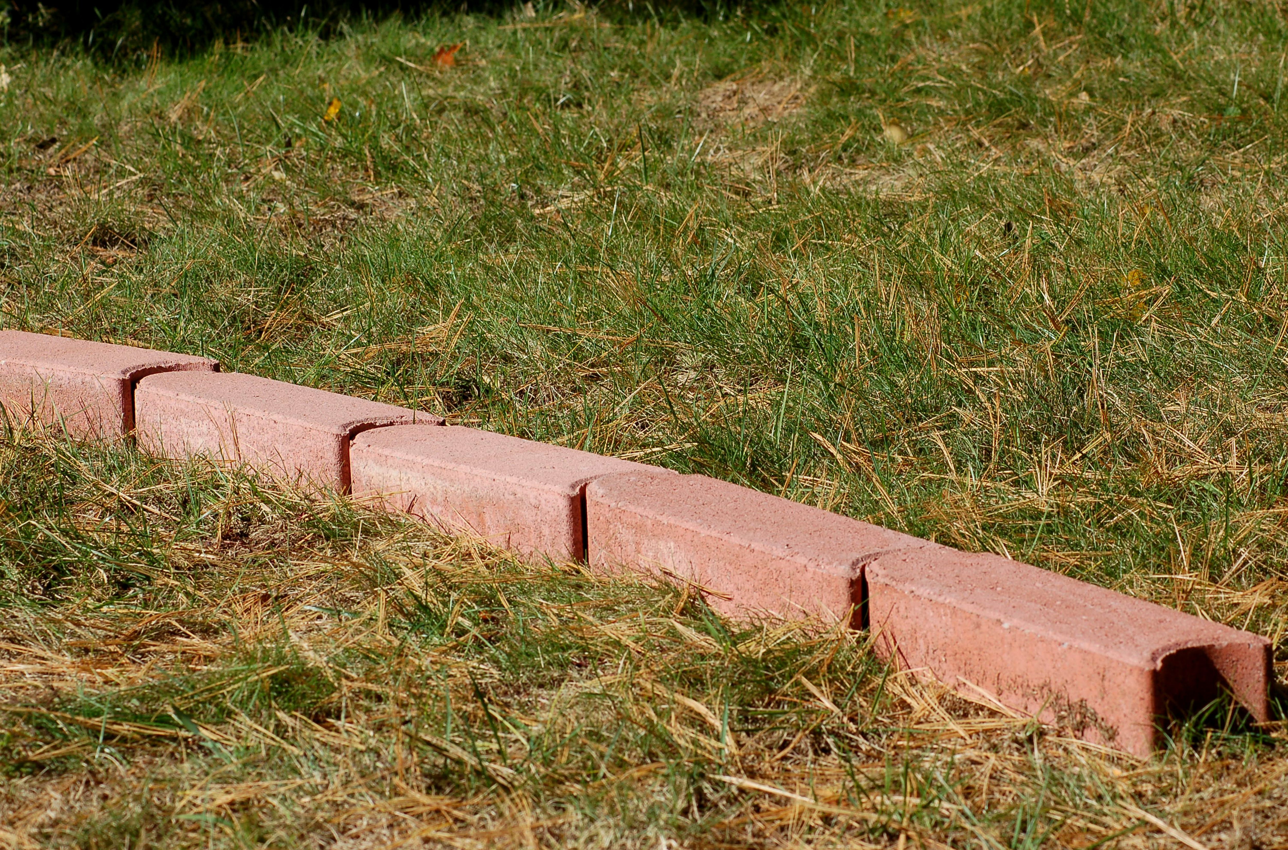 How To Install Lawn Edging Pavers To Make A Mowing Strip