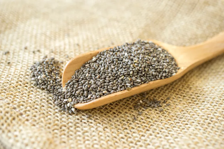 chia seeds in wooden scoop